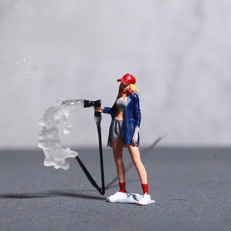 1:64 Female with watering hose